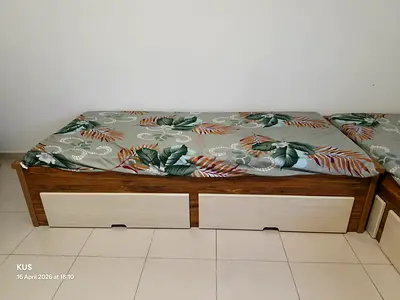 Wooden single cot with under-bed storage and two drawers with mattress (pair available)