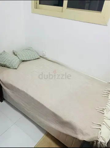 Single bed with mattress and beige throw - good condition