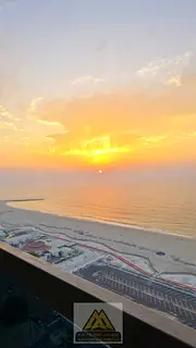 Two-bedroom apartment for rent in Ajman Corniche Towers | Direct sea view + very spacious | Family a