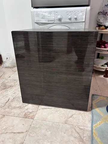 Dark wood storage cabinet with 3 vertical compartments - good condition