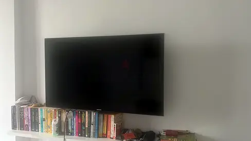 Samsung Mounted 43 “ Flat Panel smart TV in Good Condition