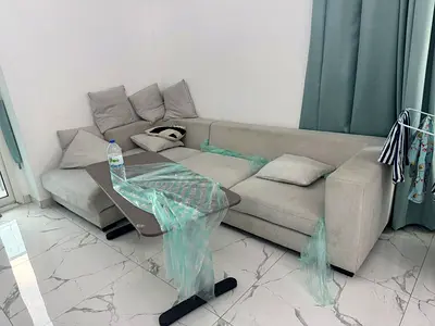 The most beautiful apartments in Al Waha Towers - two bedrooms and a living room with built-in wardrobes, parking, gym, and swimming pool - excellent