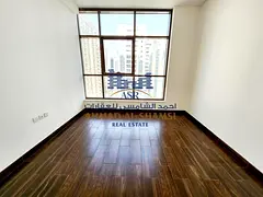 12 Cheques || Luxurious 2BR || Parking Free || Wardrobes || Easy Access To Dubai