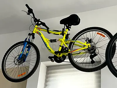 Bright Yellow Full-Suspension Mountain Bike — Good Condition