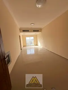2BR apartment in Al Jurf 3 Ajman, 3 baths, master bedroom, balcony, built-in wardrobes, central AC,
