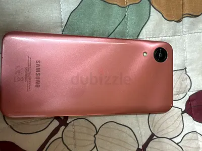 Samsung smartphone - used, good condition (pink) with minor wear