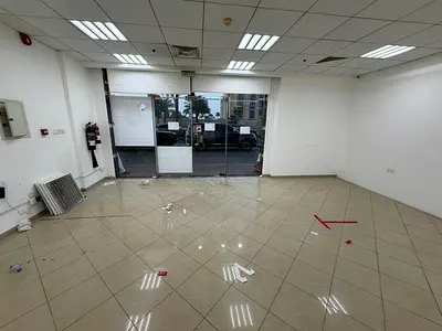 Commercial shop for rent near Ajman Corniche, Bahi Hotel, and Ajman Marina. 4,400 sqft, ideal for spa, supermarket, or medical center. AED 400K incl.