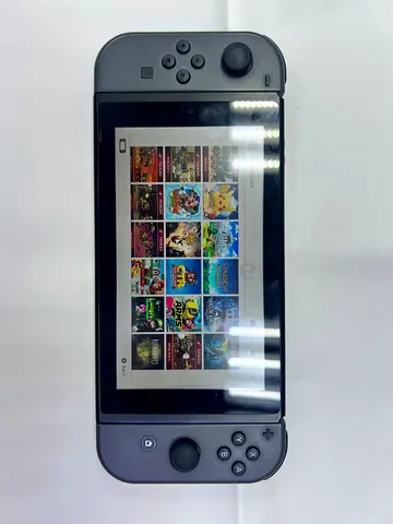 Nintendo Switch Console with Gray Joy-Con - Used, Fully Working with jailbreak with 64GB SD card