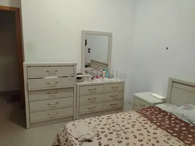 Beige Wooden Bedroom Set — Bed, Dressers, Mirror, Nightstand (Good Condition)