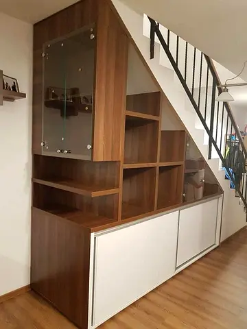 Custom Built-in Staircase Storage Unit with Shelves and Cabinets