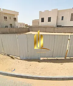 Residential land for sale in Al Hoshi area – Al Badie Suburb, Sharjah, located in a quiet and stra