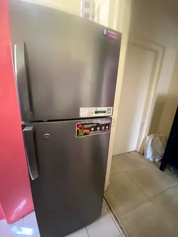 Silver Top-Freezer Refrigerator – Good Working Condition