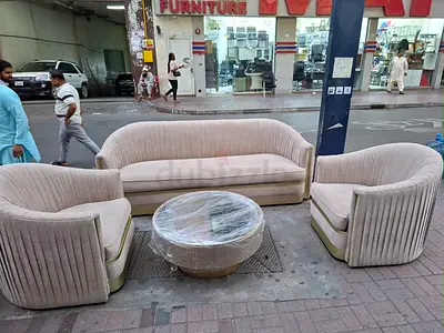 3-piece curved velvet sofa set with round coffee table - beige