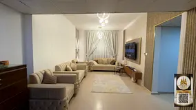 For sale: 2-bedroom apartment in Ajman City Tower, 3rd floor. The tower has 4 floors of parking, eff