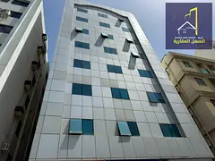 Building for sale in Umm Al Tarafa area, Sharjah, on 2 neighboring streets