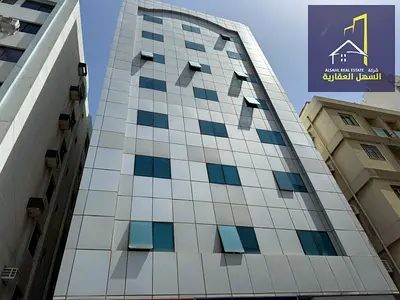 Building for sale in Umm Al Tarafa area, Sharjah, on 2 neighboring streets