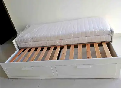 l brimness  Day bed with 2 storage drawers underneath and with 2 IKEA mattresses is available in exc