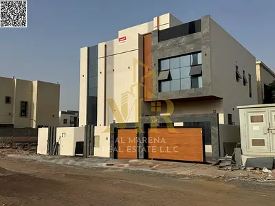 Two-story villa with a roof terrace, price includes registration and ownership fees, in one of Ajman's most prestigious areas. Freehold ownership avai