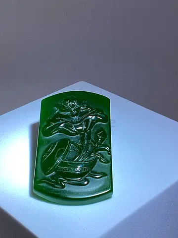 Carved Green Jade Pendant with Floral Motif