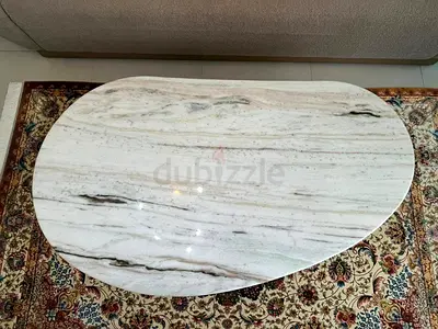Available high quality mabrel coffee table like new