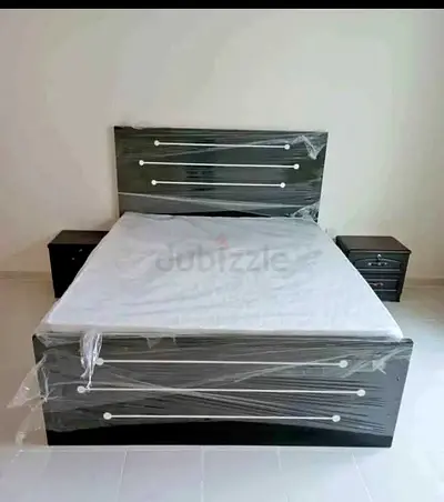 Double size bed frame with two matching nightstands - new