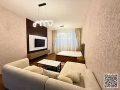 Furnished semi-detached kitchen studio with high-end, brand-new furniture for monthly rent in Ajman