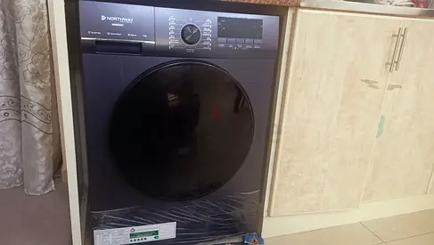 7 Months old within warranty front load washer dryer combo - black