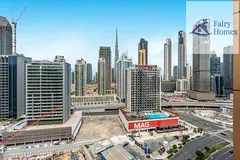 Unfurnished 2BR Apartment | ENI Coral Tower | Canal &amp; Burj View