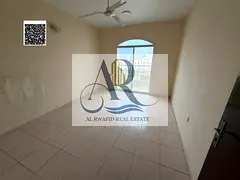 1-bedroom apartment with a living room for annual rent in Al Rumaila 1.