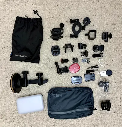 GoPro mounting accessories kit with suction cup, mounts and carrying pouch