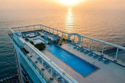 Exclusive 2BR Duplex | Beach Access | Rooftop Pool