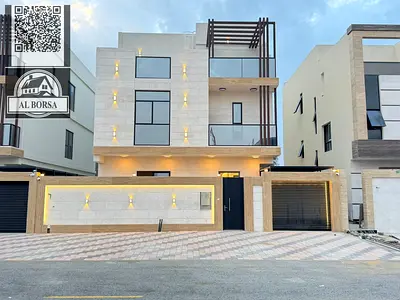 For sale in Al Helio 2, Ajman: two floors and a rooftop terrace + swimming pool, including electricity, water, and air conditioning.