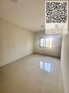 Spacious 2-bedroom apartment with a living room in Al Jurf 3 for rent | Central air conditioning and