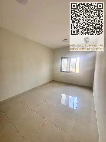Spacious 2-bedroom apartment with a living room in Al Jurf 3 for rent | Central air conditioning and balcony | Near Dubai exit