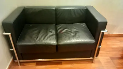 Compact Black Leather 2-Seater Sofa with Chrome Frame