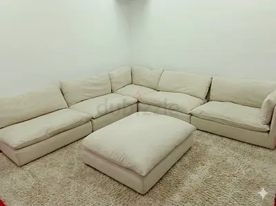Crate and Barrel beige color feather 🪶 filled modular sofa with ottoman