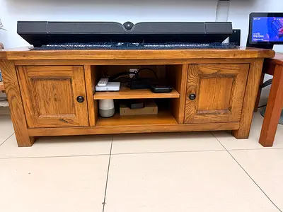Oakwood wood solid, very heavy Tv cabinet.