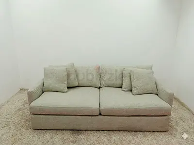 Comfortable crate and barrel beige color 3 seater sofa