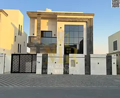 Villa for sale | Ajman | Al Amrah area | Two floors and a roof, 5 rooms, a majlis and 2 halls | Free