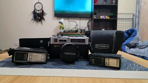 Vintage Yashica Electro 35 GSN plus kodak camera plus Polaroid instant camera