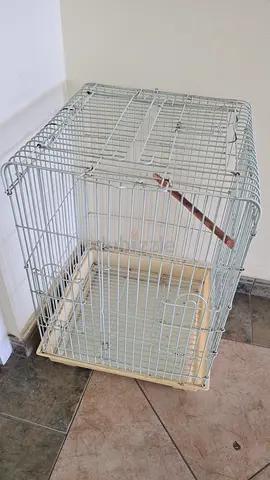 Medium white metal bird cage with wooden perches — no bottom tray 70x36
