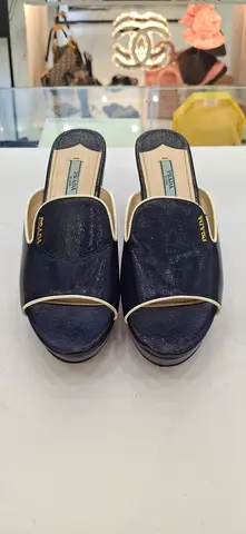 Used Prada navy leather slip-on mules, size available on request
