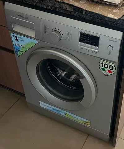 Silver front-load washing machine - working, good condition