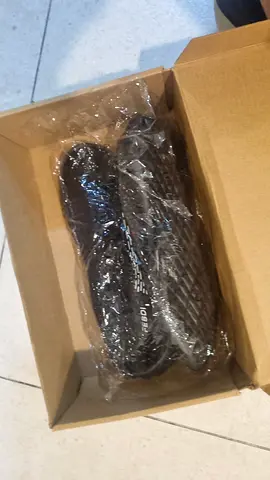 Brand new black slip-on sandals (unworn, in box)