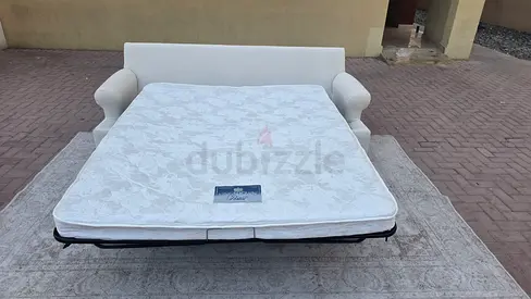Beige Cratebarrel sofa pull out sofa bed