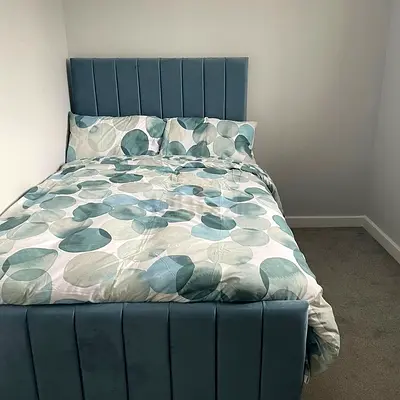 Blue velvet double bed frame with padded headboard (Good condition)