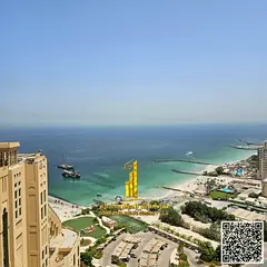 The most beautiful and upscale furnished one-bedroom apartment with a direct sea view for monthly re