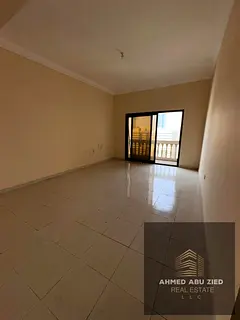Spacious 2BR + Hall Apartment for Annual Rent in Al Nuaimiya 1 Ajman – Central AC – Balcony with