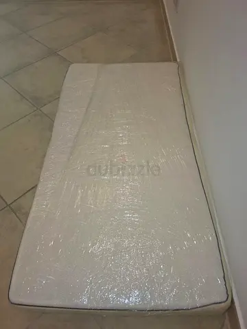Single kids  mattress (wrapped) - good condition 130x70cm
