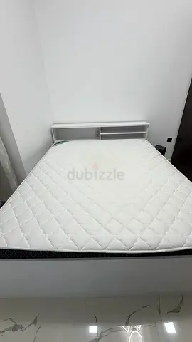 Queen bed with built-in headboard storage + Medicated mattress
